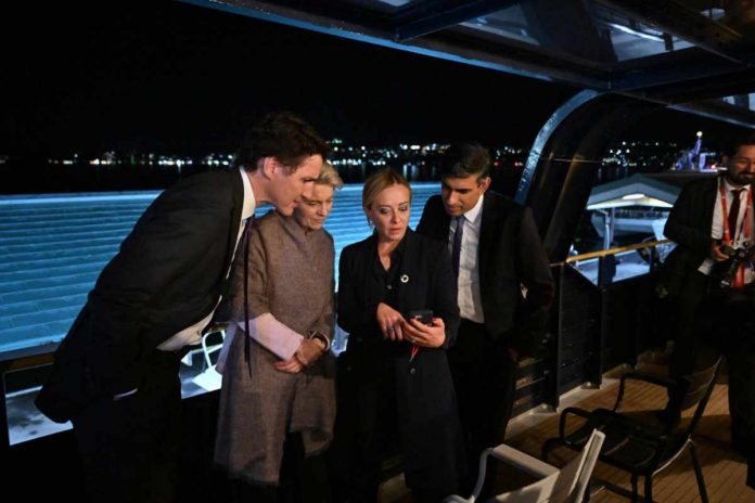 Giorgia Meloni mostra ai leader del G7 le immagini dell'Emilia Romagna Emilia Romagna, Giorgia Meloni mostra le foto dell'alluvione ai leader del G7